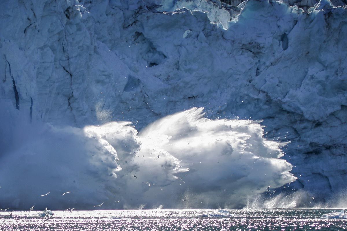 Alaska glacier calving into the ocean